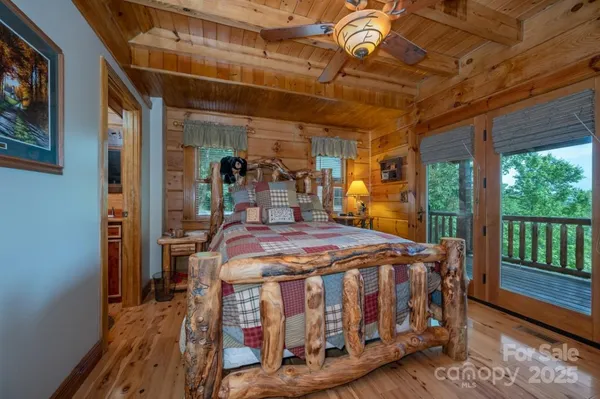 a bed sitting in a room next to a window