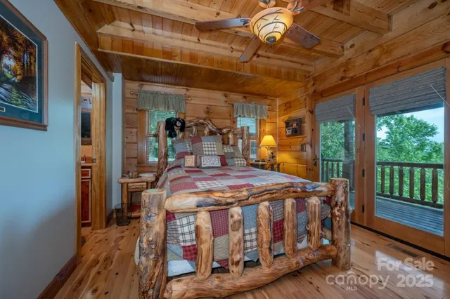 a bed room with a bed and a window