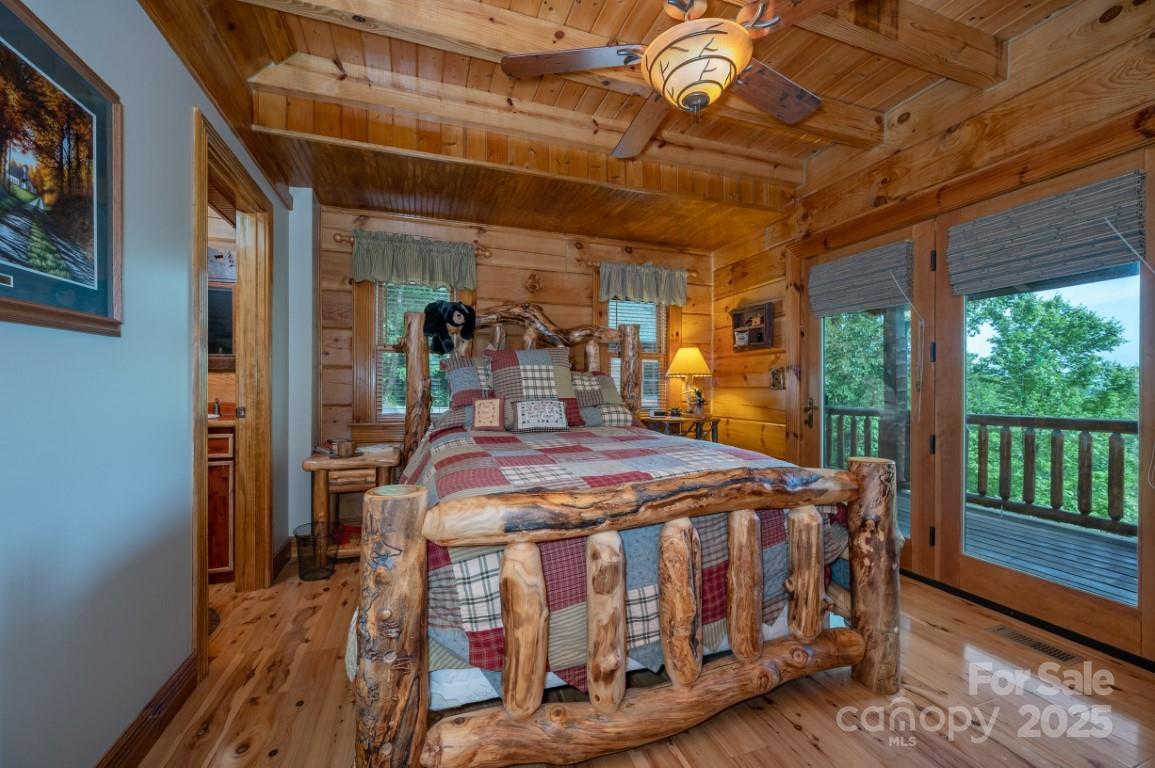 186 Black Ridge Drive Bostic, NC 28018 - Photo 16 of 47 a bed sitting in a room next to a window