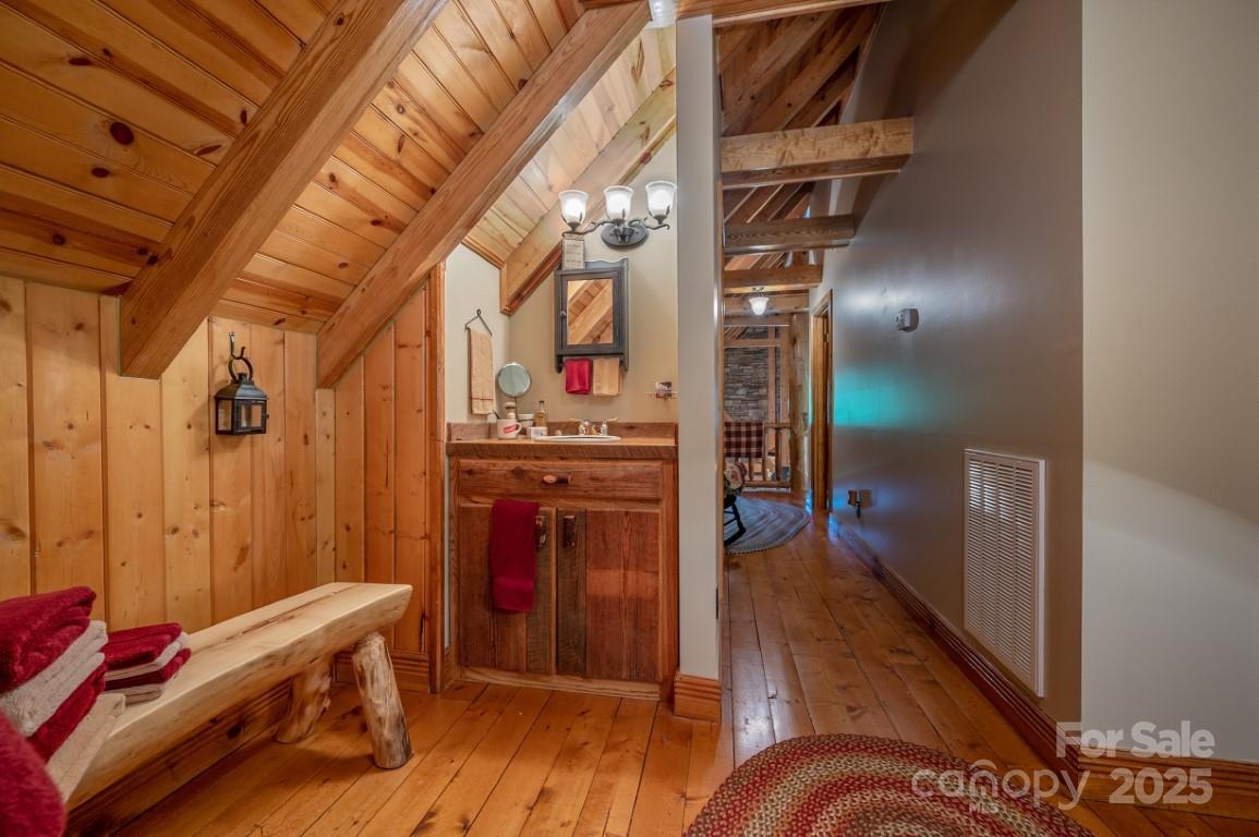 186 Black Ridge Drive Bostic, NC 28018 - Photo 25 of 47 a view of hallway with furniture and wooden floor