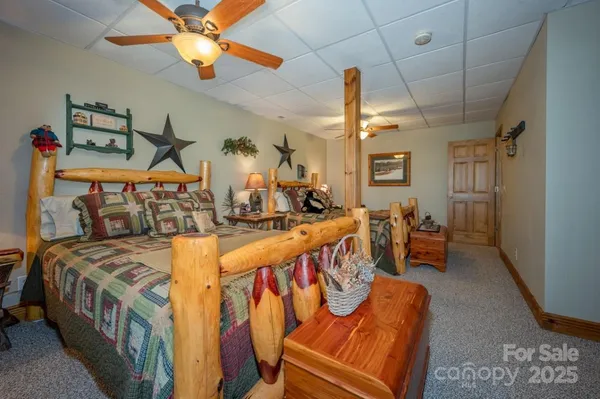 a view of a livingroom with furniture and a flat screen tv