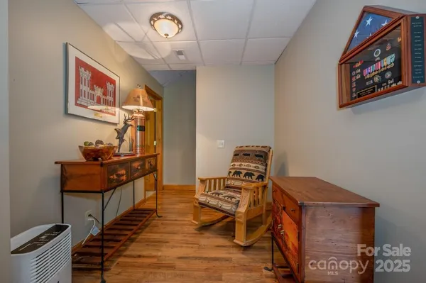 a bathroom with a sink mirror and toilet
