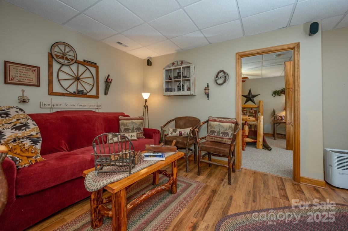186 Black Ridge Drive Bostic, NC 28018 - Photo 31 of 47 a living room with furniture and wooden floor