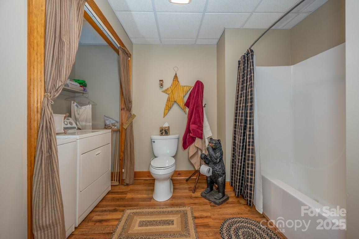 186 Black Ridge Drive Bostic, NC 28018 - Photo 33 of 47 a bathroom with a toilet and a shower curtain