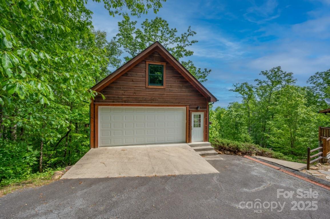 186 Black Ridge Drive Bostic, NC 28018 - Photo 38 of 47 a front view of a house with a garage