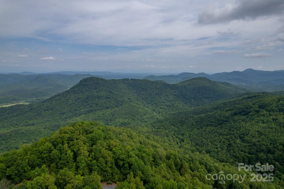 186 Black Ridge Drive Bostic, NC 28018 - Photo 41 of 47 a view of mountain with sunset in background