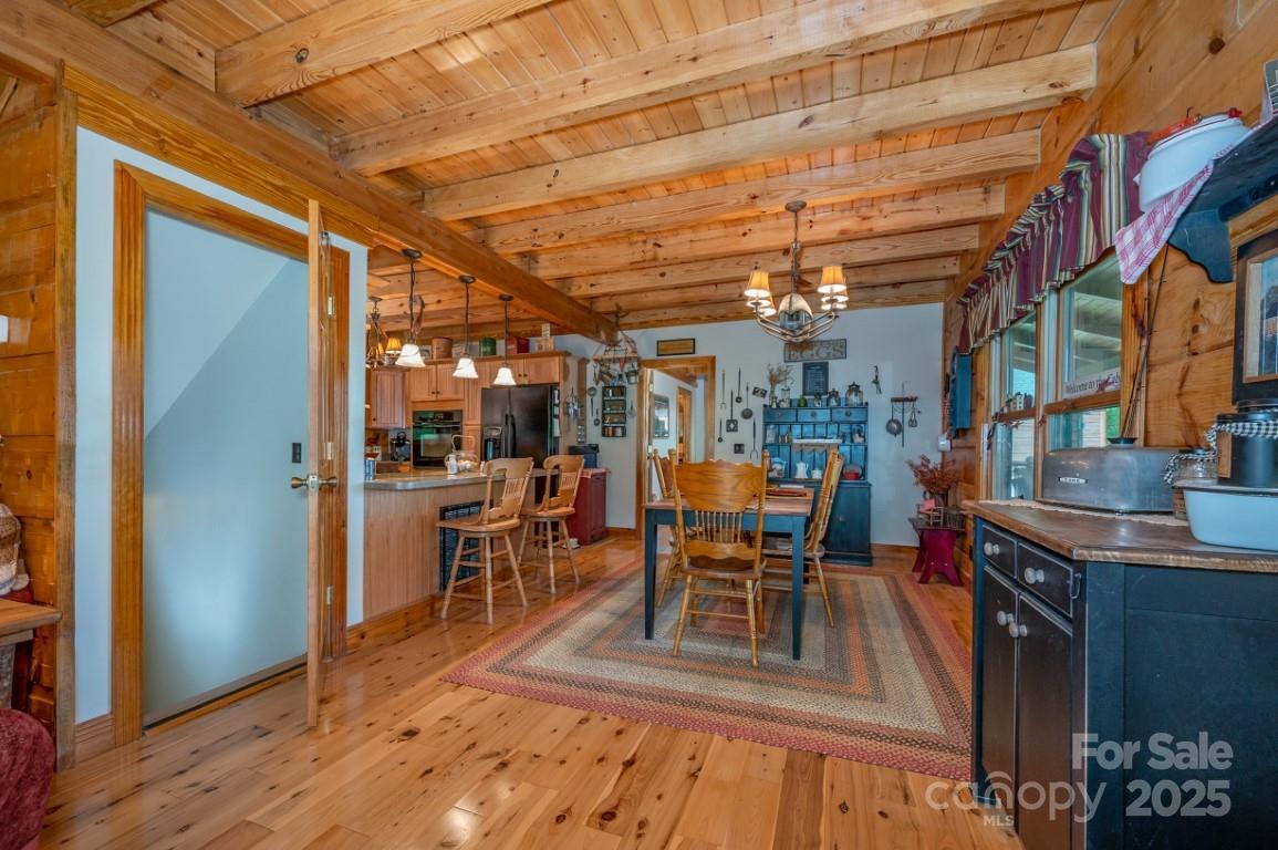 186 Black Ridge Drive Bostic, NC 28018 - Photo 10 of 47 a view of a patio with dining table and chairs