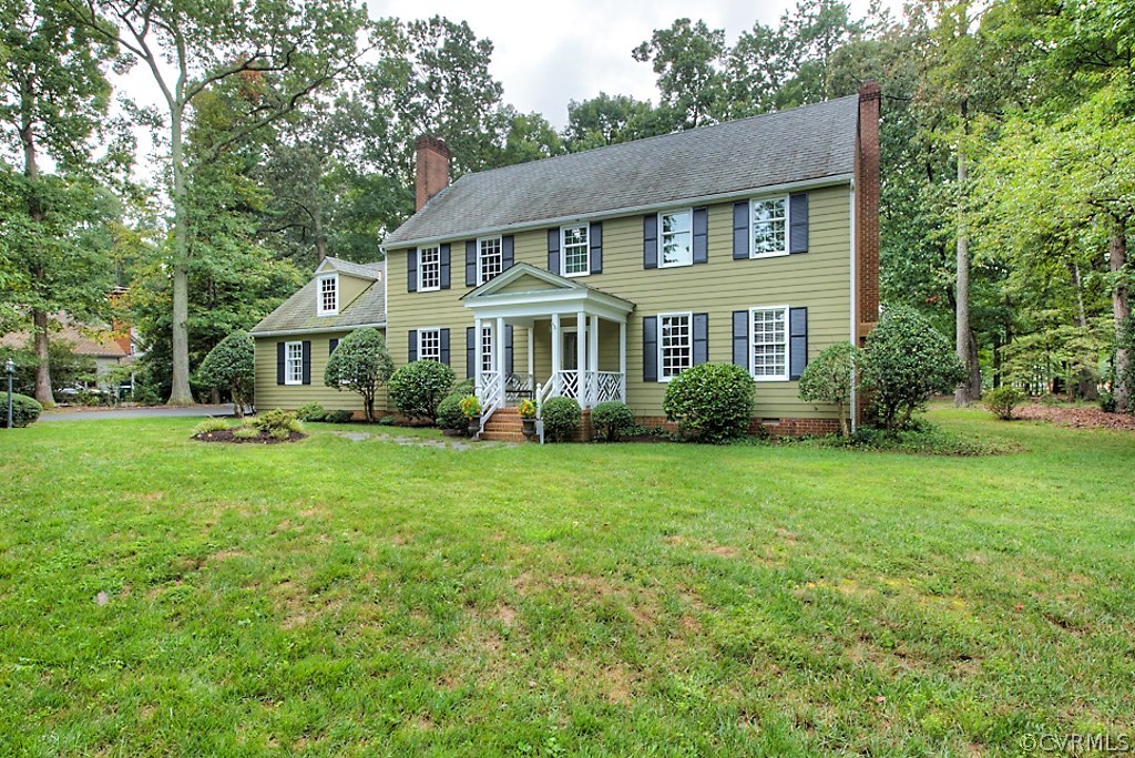 2600 Arrandell Road Midlothian, VA 23113 - Photo 2 of 45 a front view of a house with a yard and trees