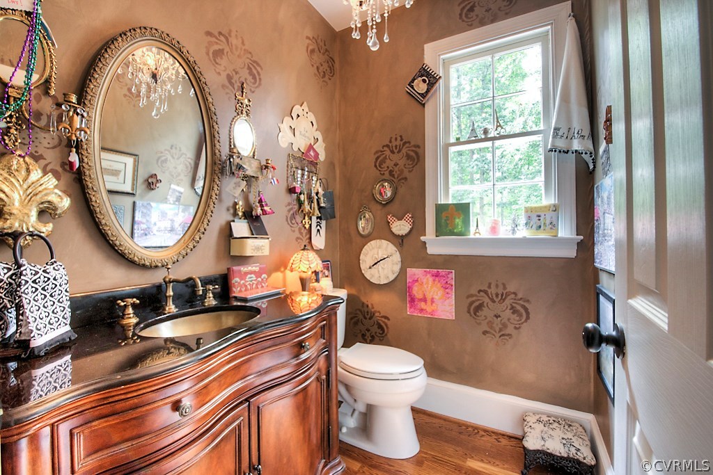 2600 Arrandell Road Midlothian, VA 23113 - Photo 21 of 45 a bathroom with a sink a toilet and a mirror