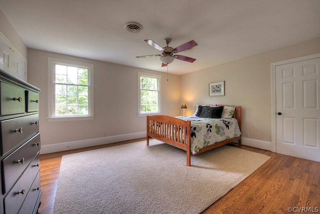 2600 Arrandell Road Midlothian, VA 23113 - Photo 27 of 45 a bed sitting in a bedroom next to a window