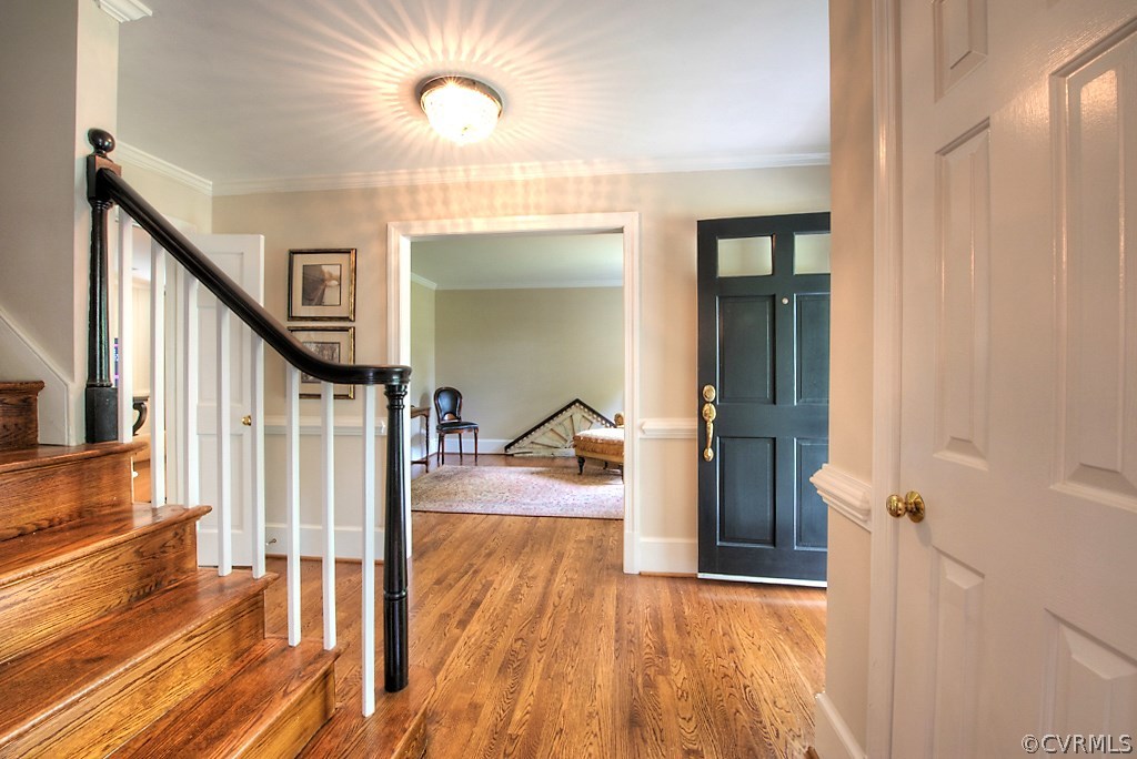 2600 Arrandell Road Midlothian, VA 23113 - Photo 3 of 45 a view of a hallway view with wooden floor and staircase
