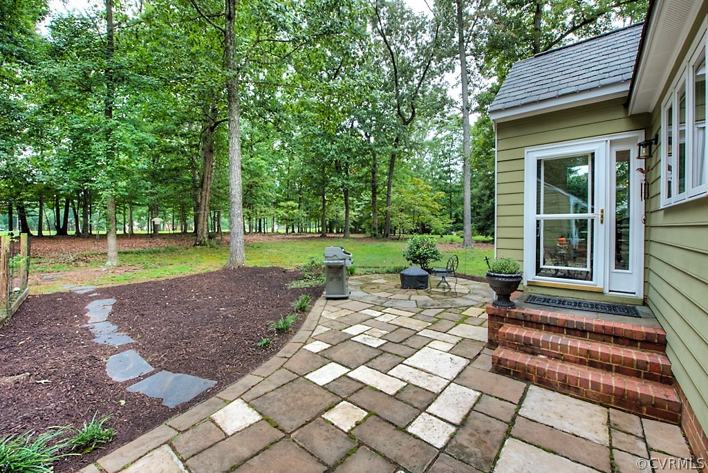 2600 Arrandell Road Midlothian, VA 23113 - Photo 40 of 45 a view of a house with backyard and sitting area