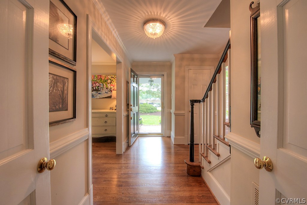 2600 Arrandell Road Midlothian, VA 23113 - Photo 6 of 45 a view of a hallway with wooden floor and staircase