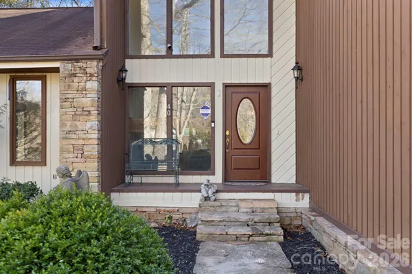 a front view of a house with a porch