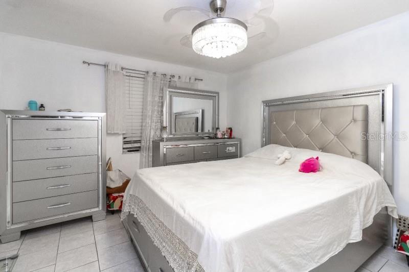 4222 Trucious Place New Port Richey, FL 34652 - Photo 7 of 13 a en suite bathroom with a sink and a mirror