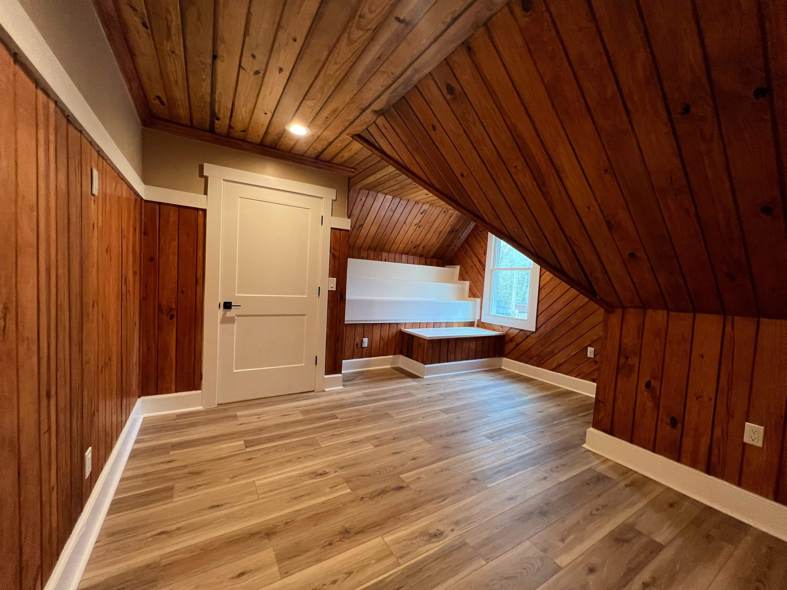 9490 Highway 196 Collierville, TN 38017 - Photo 34 of 40 Bedroom four with a vaulted wooden ceiling, wooden walls, and light wood-style floors