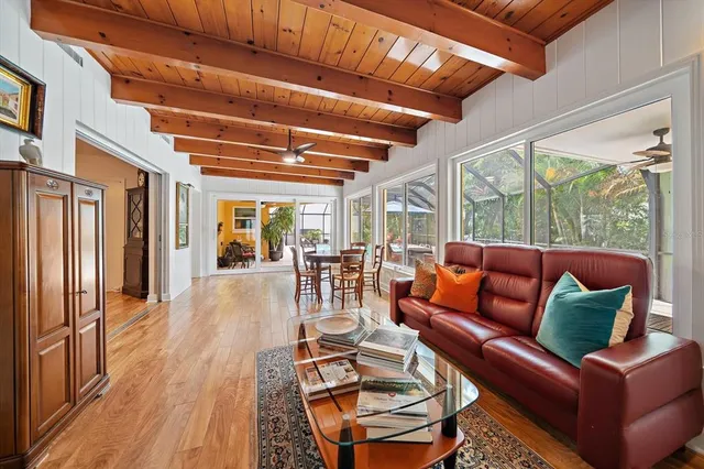 a bedroom with a bed and a table