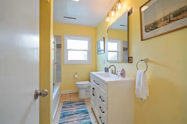 a room with furniture and a book shelf