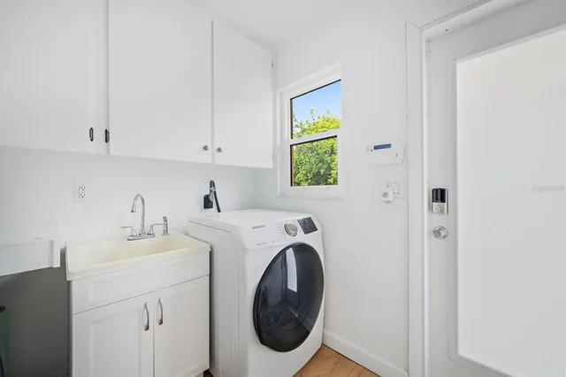 a backyard of a house with outdoor seating