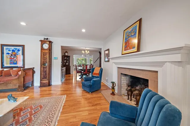 a kitchen with granite countertop a refrigerator stove top oven and sink