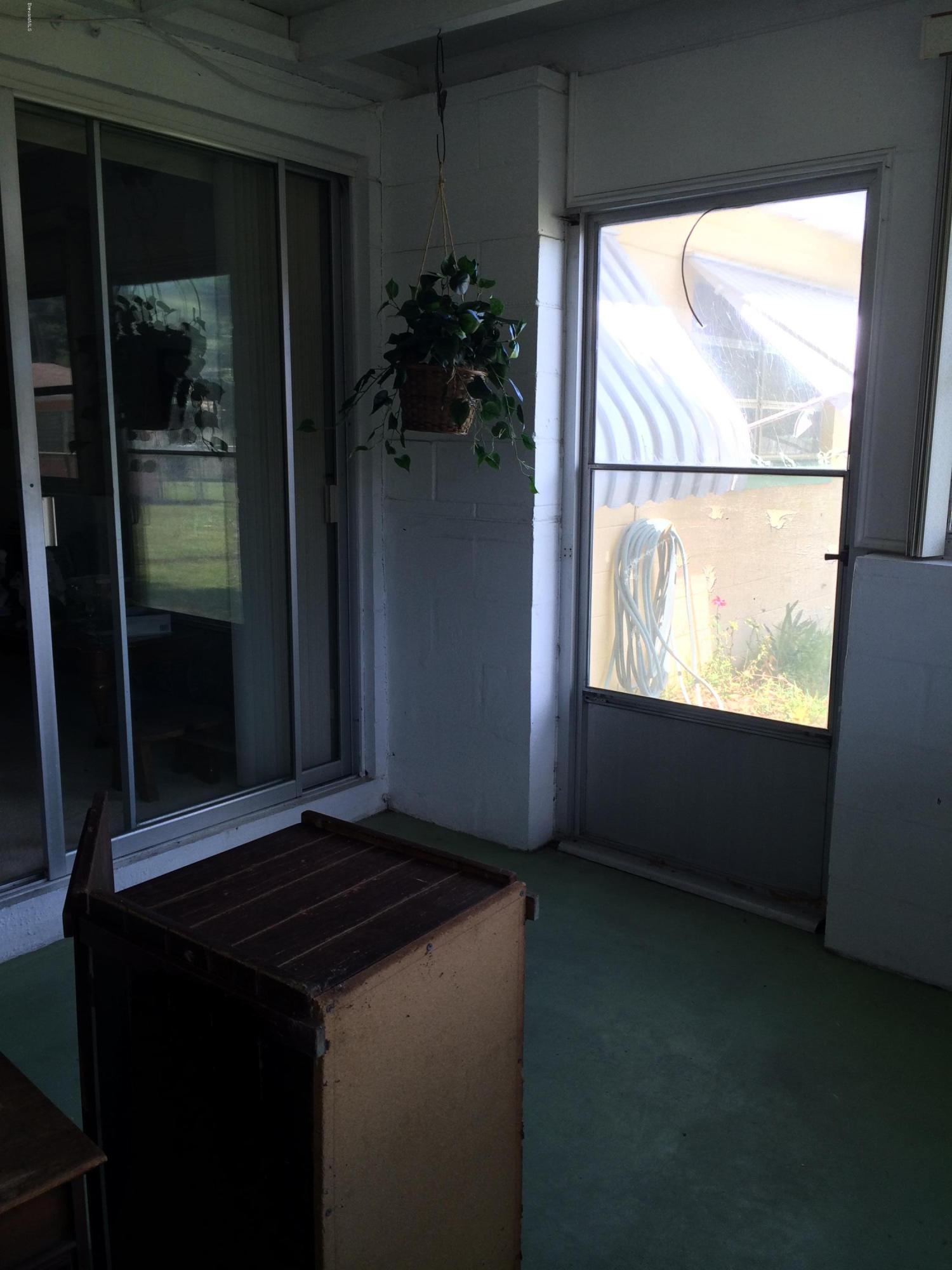 274 Lee Road Melbourne, FL 32904 - Photo 5 of 10 Enclosed Porch