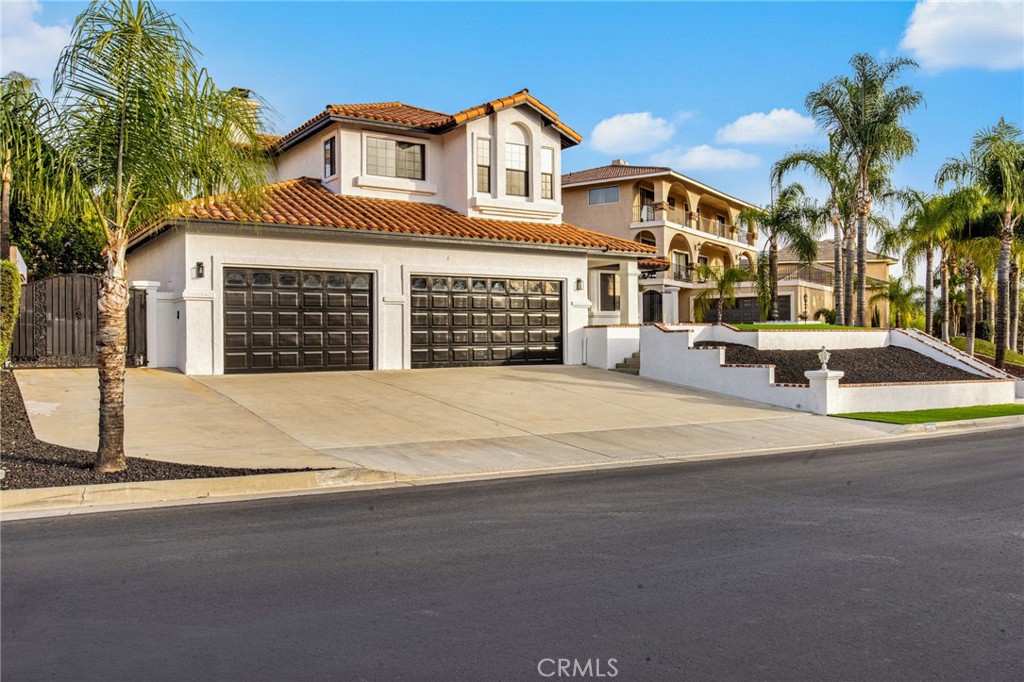 29566 Big Range Road, Unit 2 Canyon Lake, CA 92587 - Photo 2 of 27 front view of a house with a yard