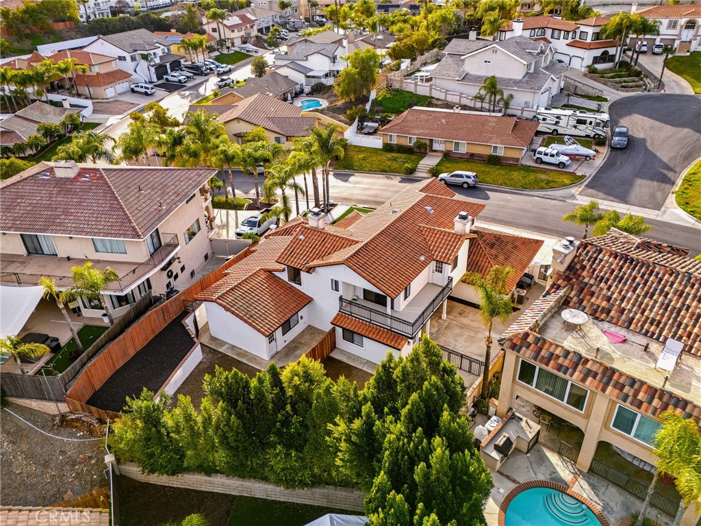 29566 Big Range Road, Unit 2 Canyon Lake, CA 92587 - Photo 25 of 27 an aerial view of a swimming pool with outdoor seating