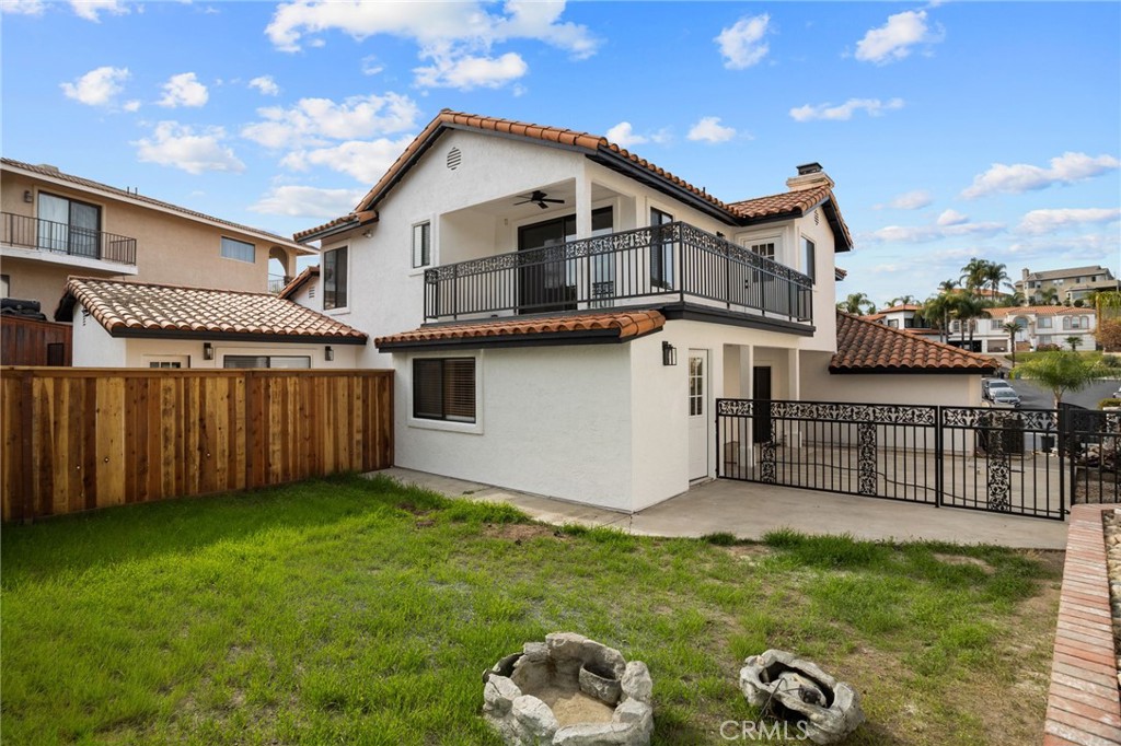 29566 Big Range Road, Unit 2 Canyon Lake, CA 92587 - Photo 5 of 27 a front view of a house with garden
