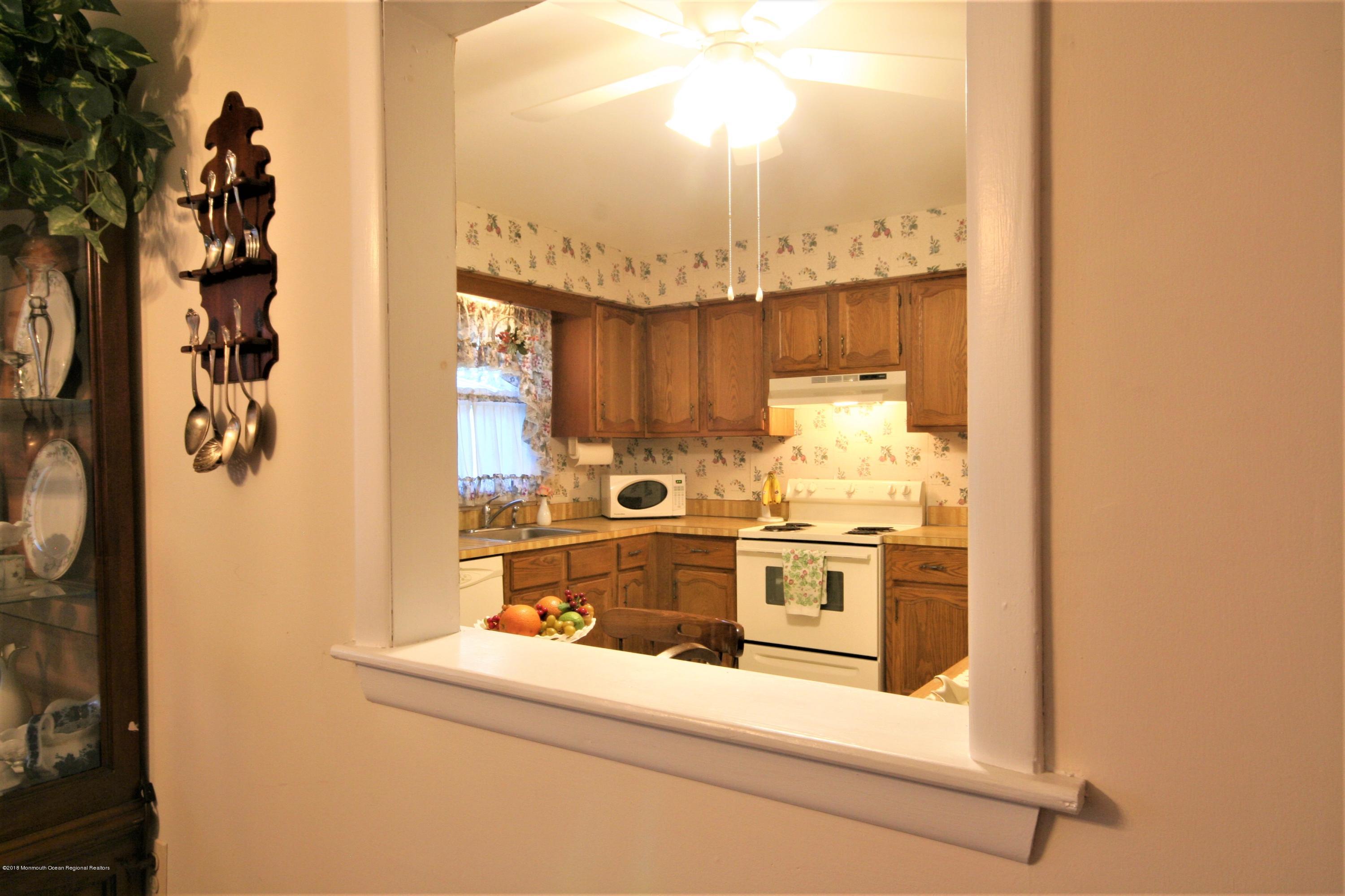 35 Magnolia Road, Unit 18 Manahawkin, NJ 08050 - Photo 11 of 23 KITCHEN PASS THROUGH