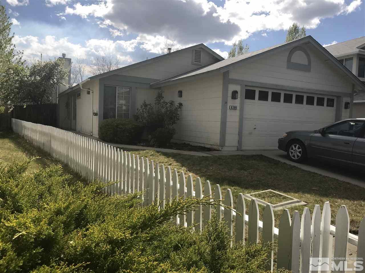 6396 Chesterfield Lane Reno, NV 89523 - Photo 1 of 21 a front view of a house with a yard