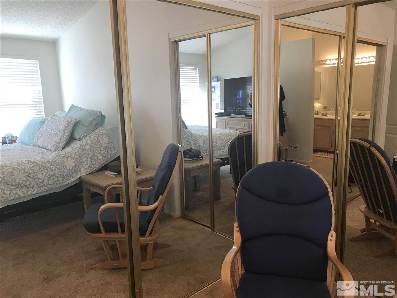 6396 Chesterfield Lane Reno, NV 89523 - Photo 14 of 21 a living room with furniture and a bathroom
