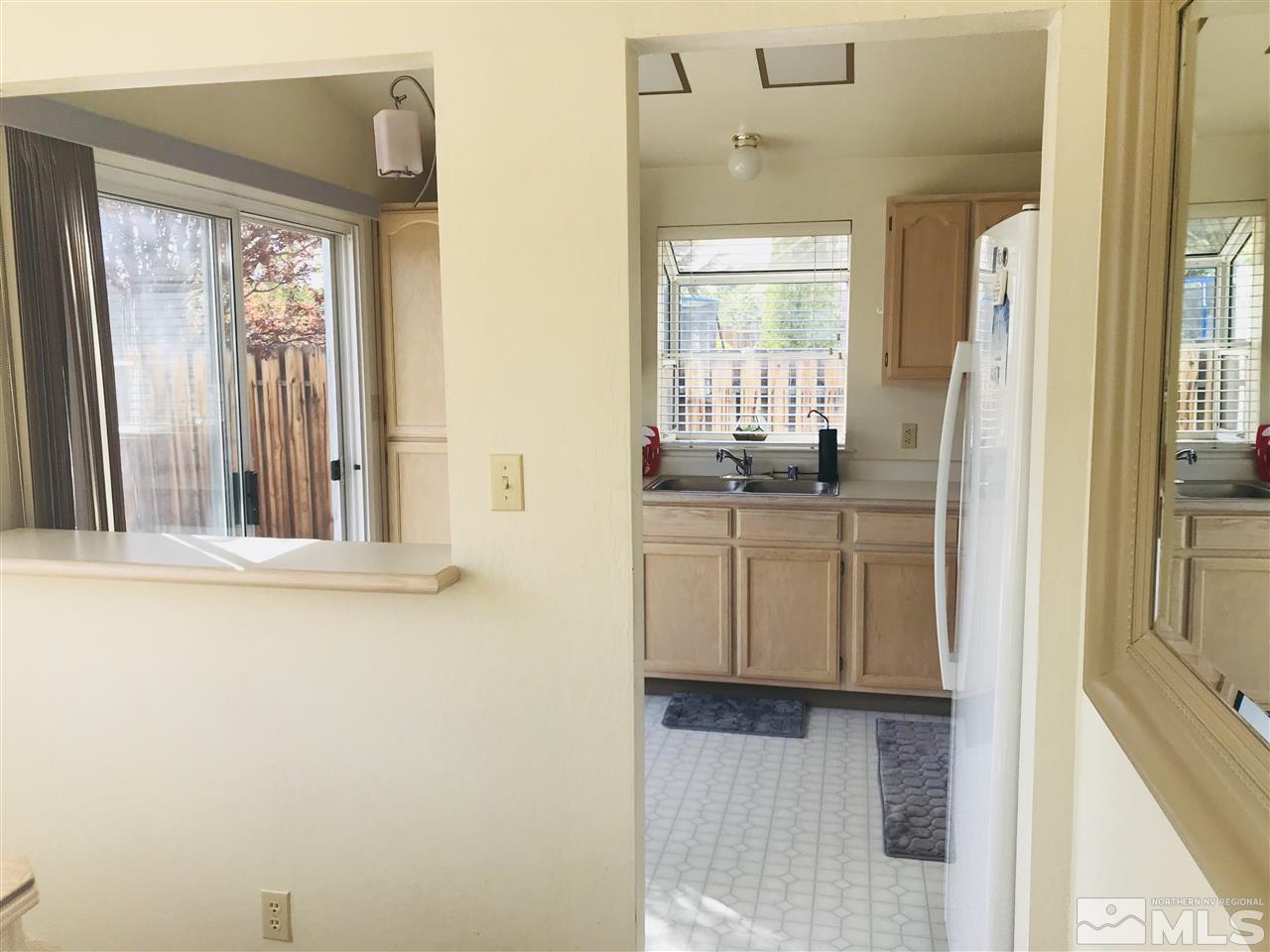 6396 Chesterfield Lane Reno, NV 89523 - Photo 8 of 21 a bathroom with a sink and a mirror