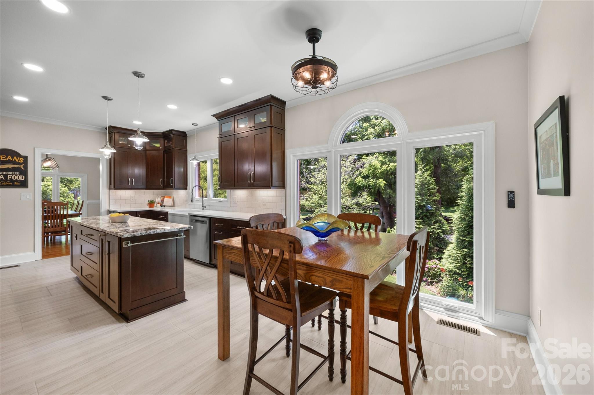 636 Landsdowne Court Fort Mill, SC 29708 - Photo 13 of 48 a kitchen with a table and chairs in it