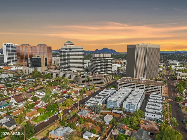 a view of a city with tall buildings