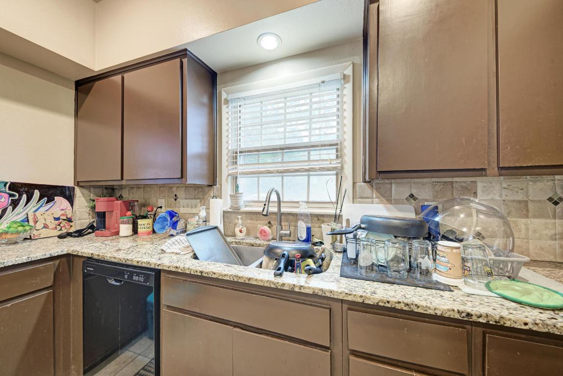 3200 Duval Street, Unit 101 Austin, TX 78705 - Photo 22 of 39 a kitchen with sink and window
