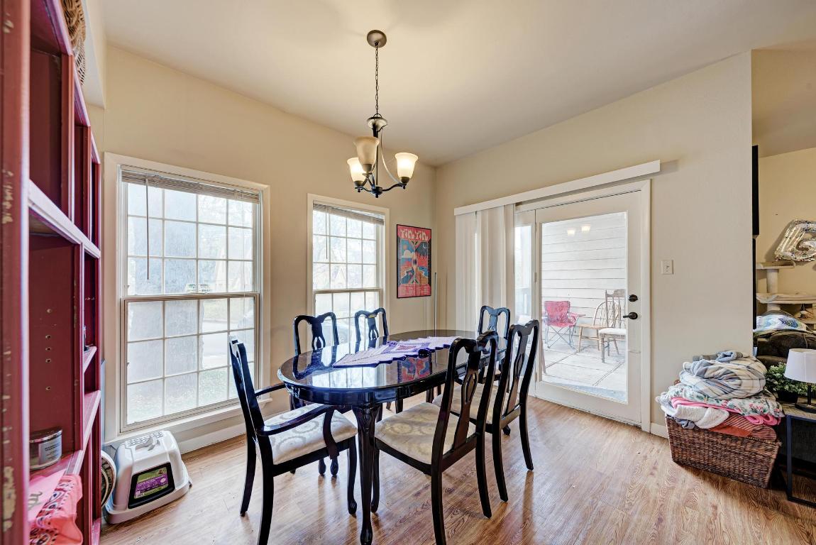 3200 Duval Street, Unit 101 Austin, TX 78705 - Photo 24 of 39 a view of a dining room with furniture window and outside view