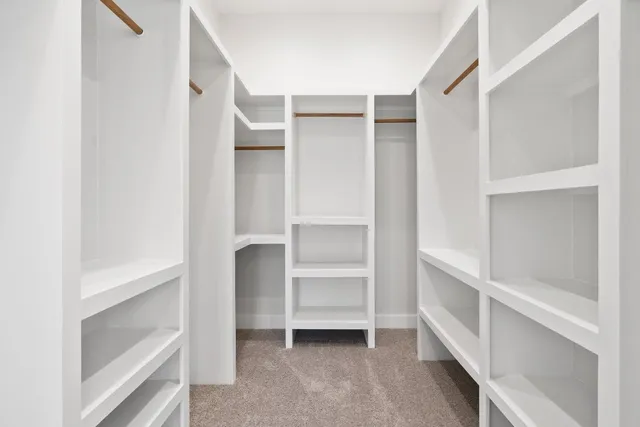 a view of an empty walk in closet