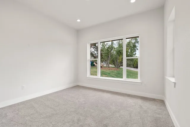 an empty room with windows