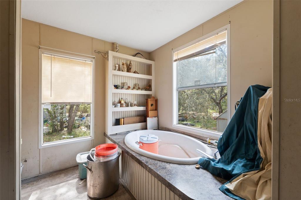 17221 Nicks Drive Spring Hill, FL 34610 - Photo 21 of 33 a very nice looking room with a large window