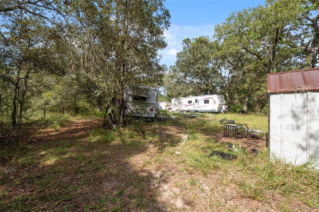 17221 Nicks Drive Spring Hill, FL 34610 - Photo 27 of 33 a view of a street with trees