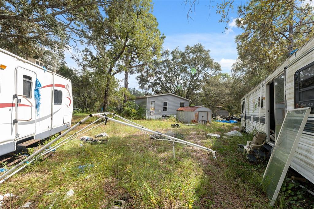 17221 Nicks Drive Spring Hill, FL 34610 - Photo 29 of 33 a view of a house with a yard