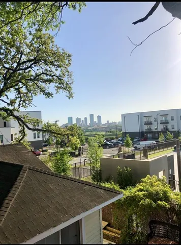a view of a lake with a city