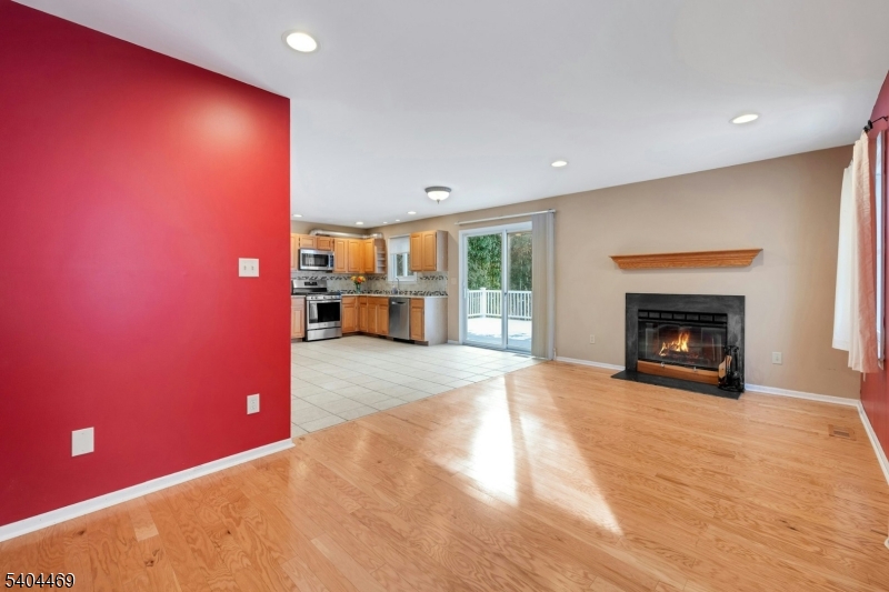 40 White Meadow Road Rockaway, NJ 07866 - Photo 18 of 41 a view of an empty room with a fireplace
