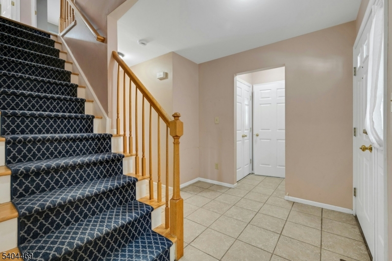 40 White Meadow Road Rockaway, NJ 07866 - Photo 5 of 41 a view of entryway with wooden floor