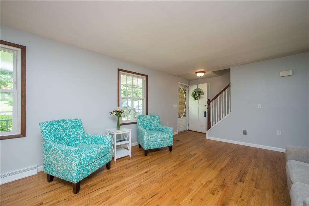 Room Size: 19x12 Living Room with refinished hardwood floors