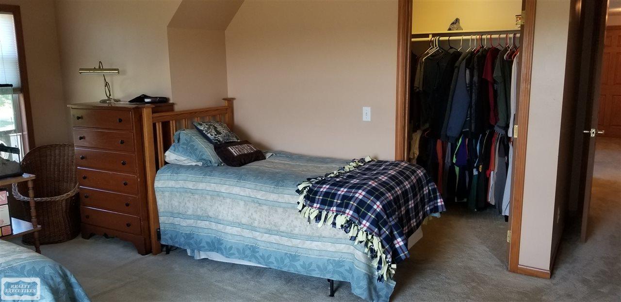 13847 Masters Road Allenton, MI 48002 - Photo 24 of 37 2nd Floor Bedroom with Walk-in Closet