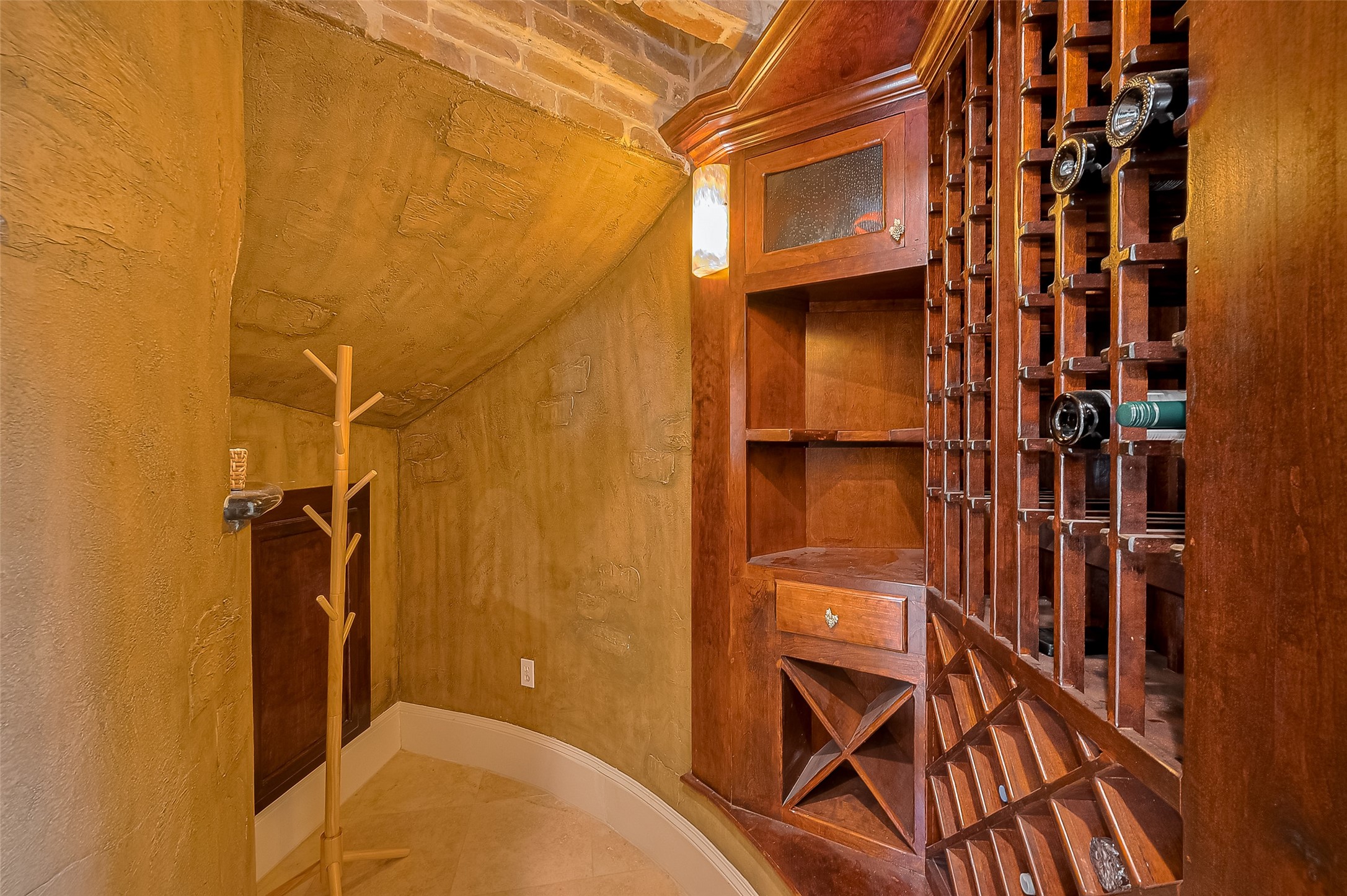 6419 Rodrigo Street Houston, TX 77007 - Photo 5 of 35 Check out the tastefully designed under the stairs wine room, adds a beautiful and fun custom touch to the home.
