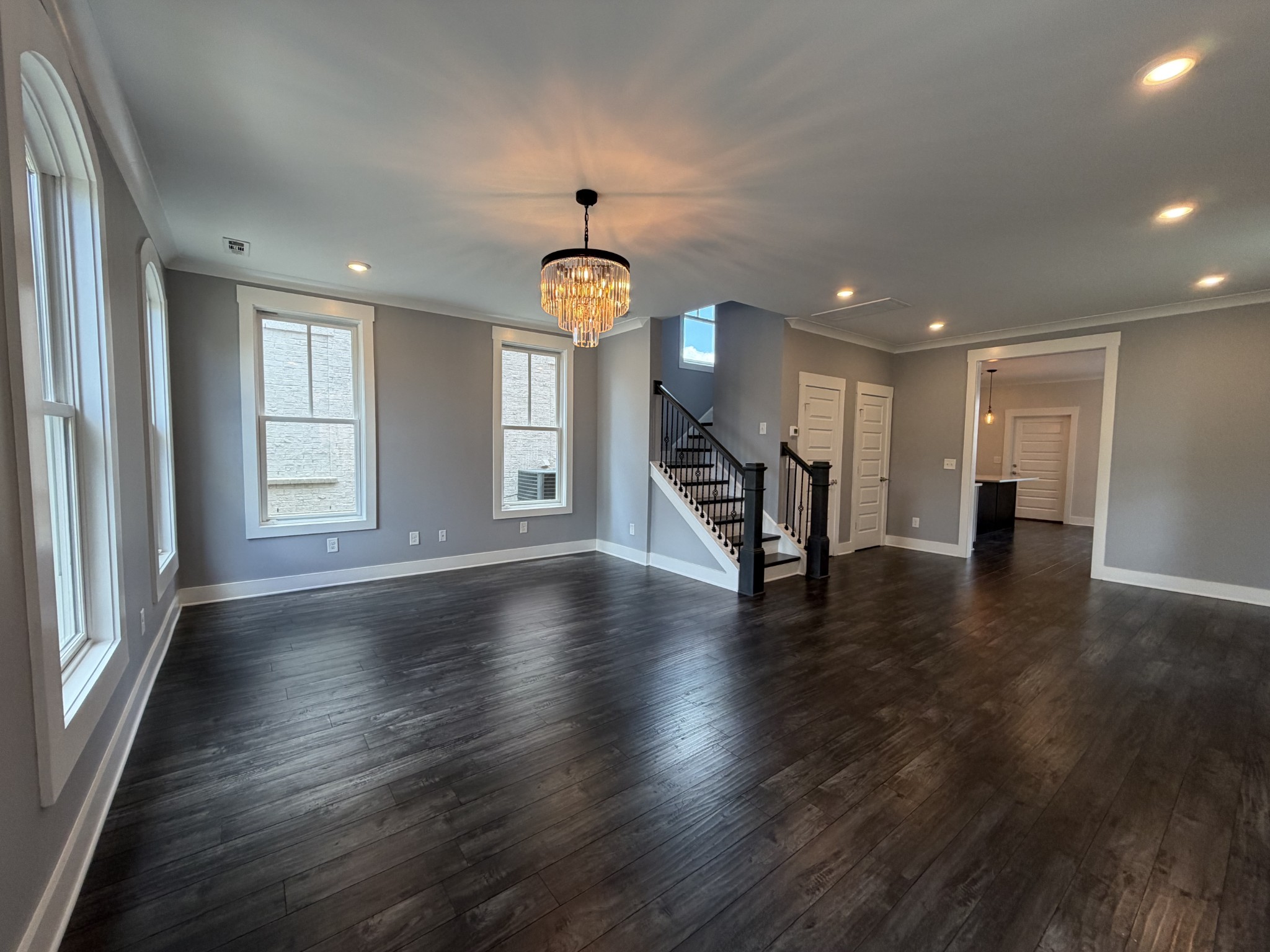 3097 Rural Plains Circle Franklin, TN 37064 - Photo 3 of 28 an empty room with wooden floor and windows