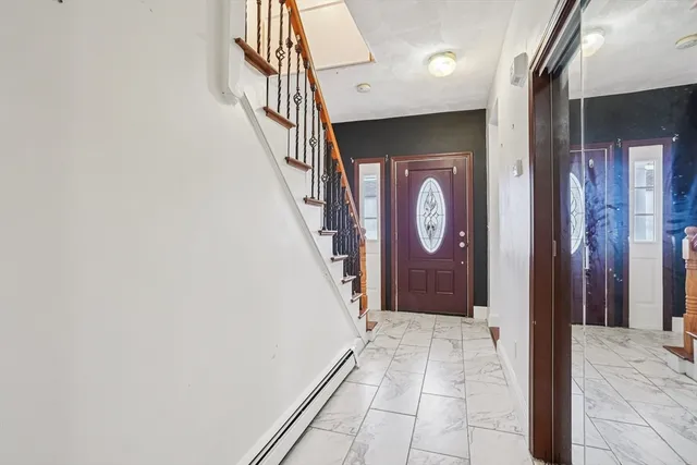 a view of entryway with a front door