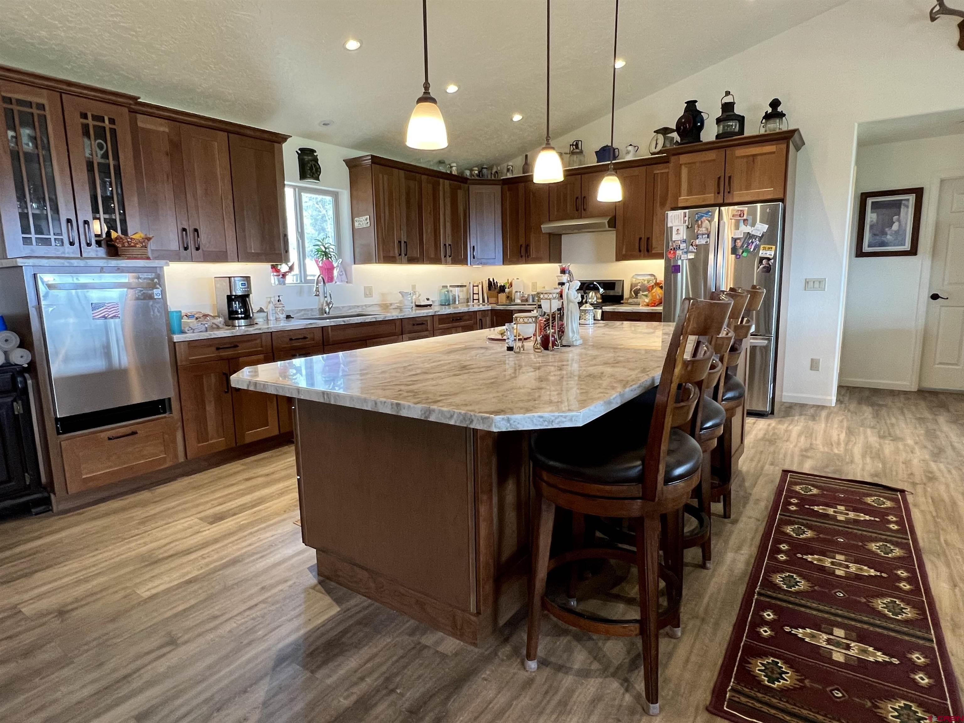 23105 U Road Cedaredge, CO 81413 - Photo 13 of 33 a large kitchen with lots of counter space